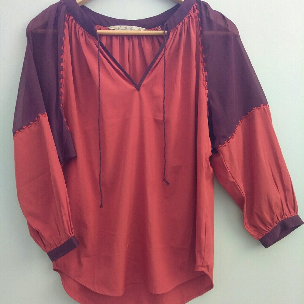 Orange and plum v-neck blouse